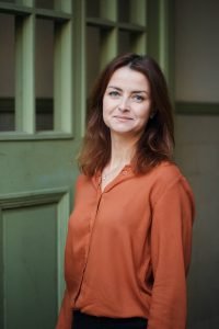 Portrait of Oksana Potelchak, a Ukrainian educator at the German-Scandinavian School in Berlin, who participated in the Ukraine Youth Action Network (UYAN), a program by MapWorks Learning. She guided her students through a collaborative international project focused on empathy, leadership, and civic engagement.